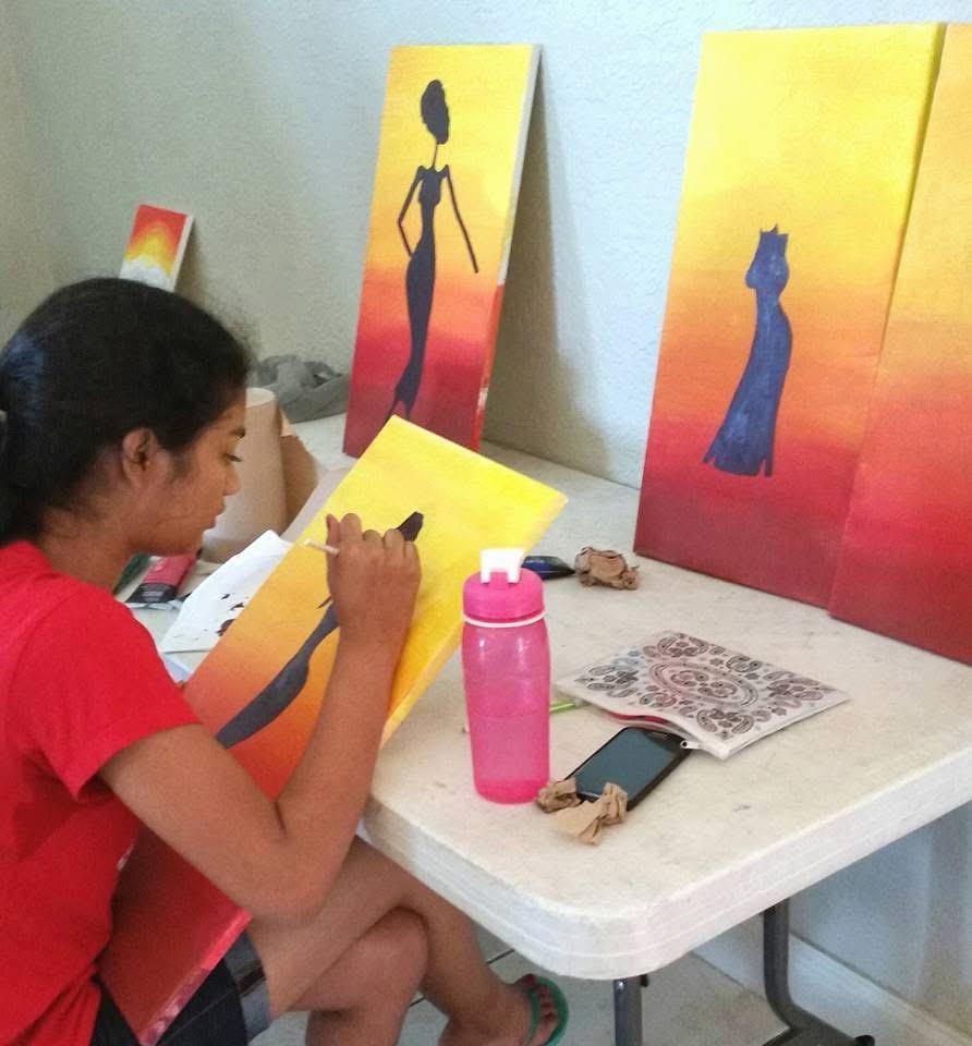 Student Enjoying Painting